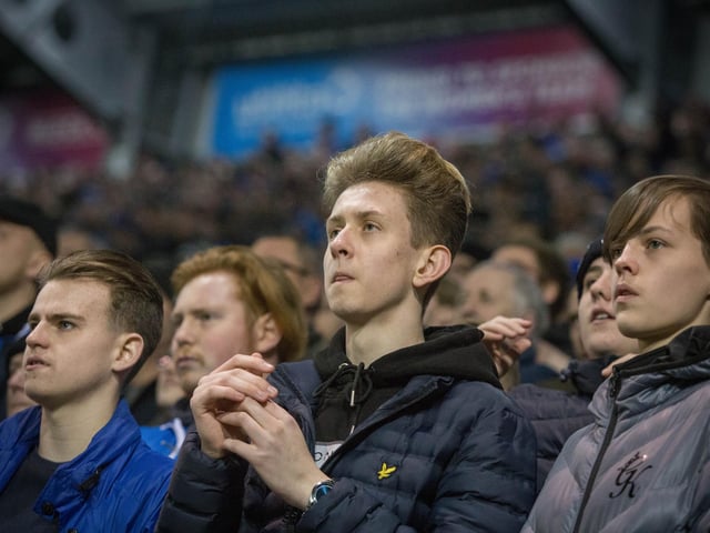 Pompey fans react to the action at Fratton Park