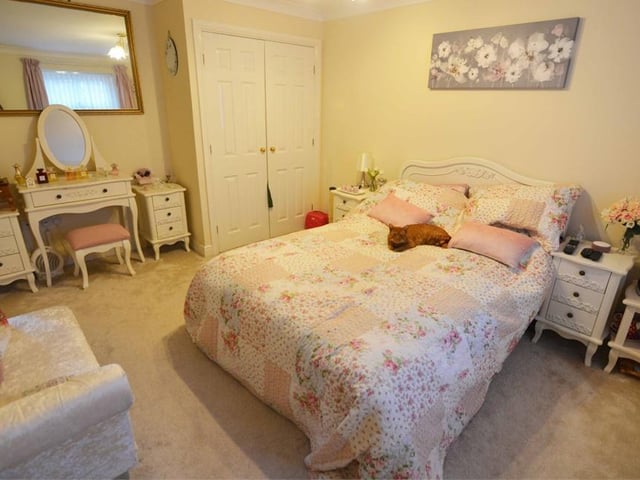 The second double bedroom is both sizeable and elegant. It also has its own en suite, plus a built-in wardrobe and carpeted floor