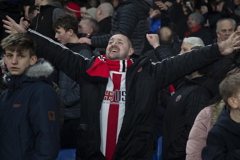 A United fan celebrates his side's 1-0 win at Crystal Palace in February 2020.