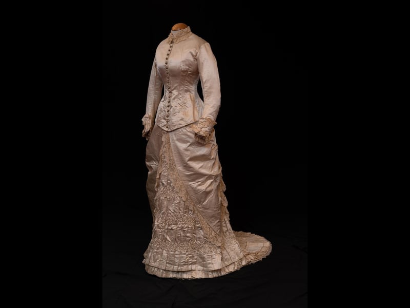 This wedding dress would have been the talk of the town when worn by Agnes Helen Gordon for her marriage to Donald MacDougall in June 1882. The couple ran a shop and following the death of her husband, Mrs MacDougall continued in business and became a prominent figure in Grantown life.