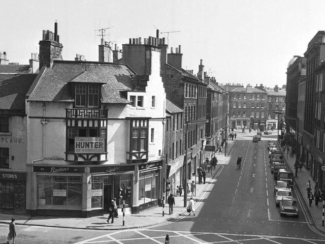 A Hunter demolition sign was placed on the corner above Rankins fruit & veg shop on the east side of Early Grey Street, which was due to be demolished.