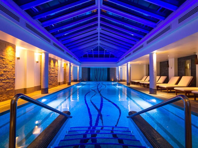 A rooftop hot tub, spa treatments, a golf course, fine dining and over 200 whiskies makes Old Course Hotel in St Andrews a dream luxury getaway.
