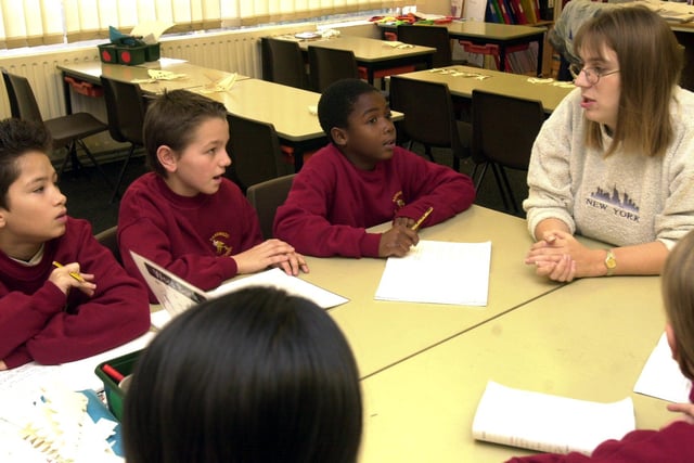 Pupils at work at Bankwood Primary School, Gleadless in 2003. From left: Joseph Din, Micah Bishop and Tawanda Rupere (all 10) with Y6 teacher Jenny Thornsby