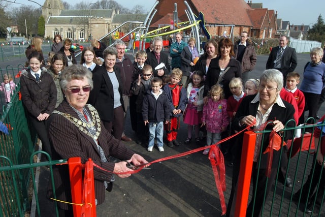 Coun Toni Bennett, Chairman of Bolsover Town Council Cuts the ribbon to open the new play area at Hornscroft Park in 2008 with the help of Rita Reed, Chairman of the Friends of Bolsover Park.