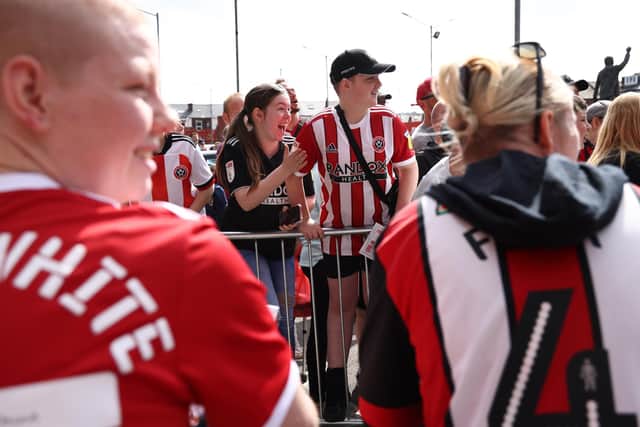 Sheffield United fans wait for the players to arrive before for the Sky Bet Championship against Fulham at Bramall Lane: Darren Staples / Sportimage