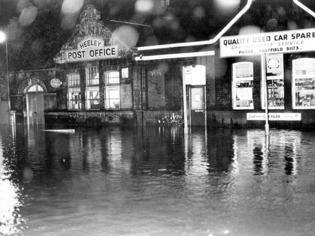 A flooded London Road, Heeley, under the railway bridge in 1982