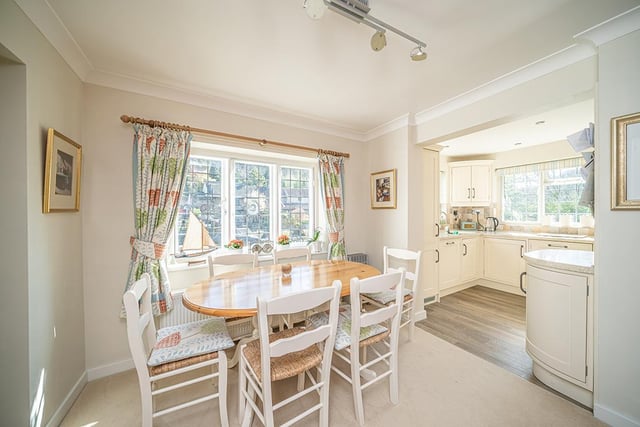 Adjoining the kitchen is a cosy breakfast room, where you can sit and enjoy views of the river while you dine.