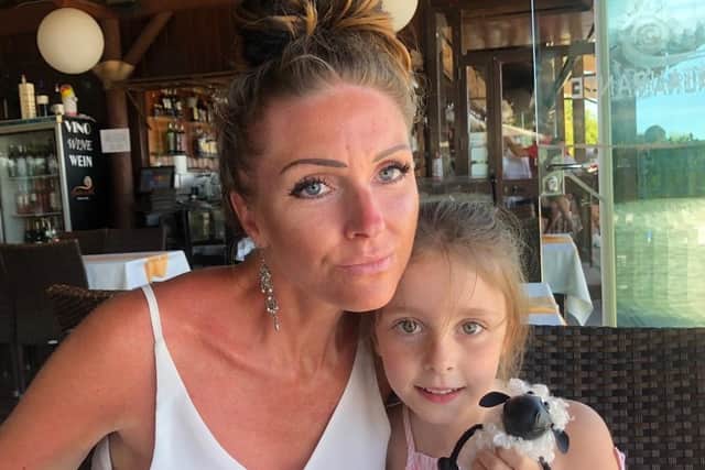 Amy Smith with daughter Isla on holiday two years ago.