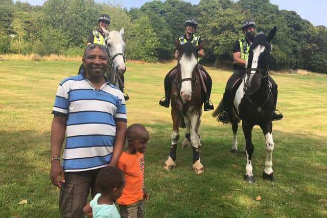 Mounted police officers with a family in Firth Park - while on patrol following a ‘harrowing incident’