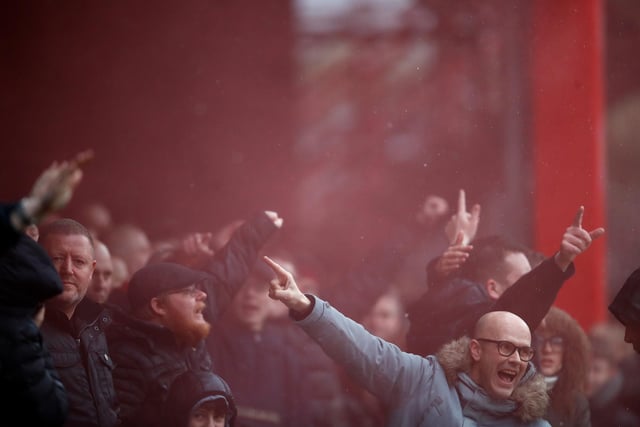Unitedites in high spirits at Griffin Park for their side's Sky Bet Championship match with Brentford in March 2018.