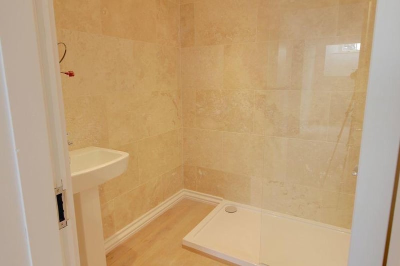 A well-decorated three-piece en suite adds to the appeal of the second bedroom. Its highlight is a walk-in shower.