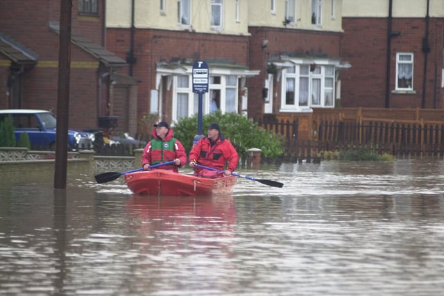 Catcliffe floods, Rotherham where a boat was seen floating in flood waters in November 2000