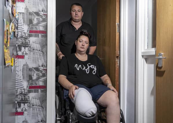 Charlene Harris-Hextall and her husband Gareth. Charlene's wheelchair doesn't fit through the doors at their home on Park Walk. Picture Scott Merrylees