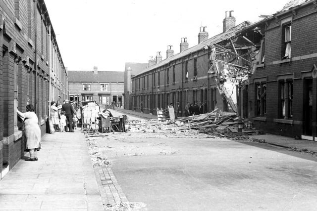 The home of a family of seven was partly demolished in Falder Road, yet they all escaped without harm in 1940.