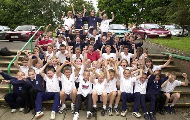 Pictured at Westfield School, Mosborough, Sheffield, where pupils who have done well in team and individual sports gathered for an end of term picture. Seen are the pupils as they give themselves a cheer, July 20, 2001