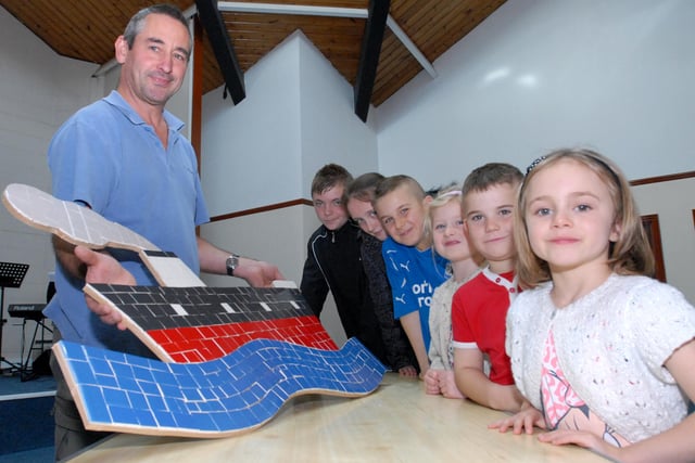 Artist Mark Todman was pictured with the youngsters at the Living Waters Church in Laygate and their mosaic ship in 2010. Is there someone you know in the photo?