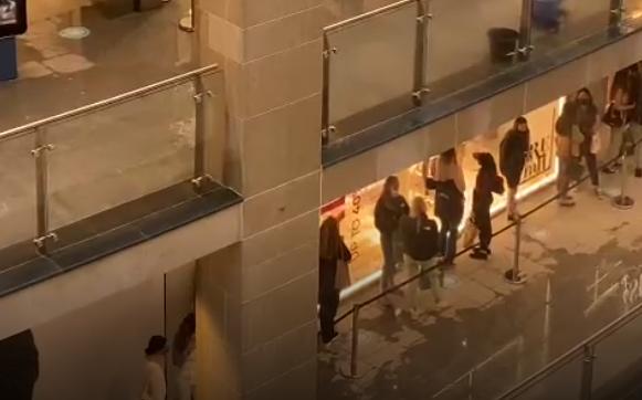 Edinburgh's new St James Quarter flooded during the thunderstorm on Sunday. Shoppers were seen gathered in the building's more sheltered areas as water leaked through the roof.