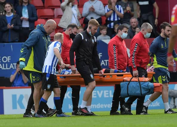 Callum Paterson had to be stretchered off for Sheffield Wednesday at Charlton.