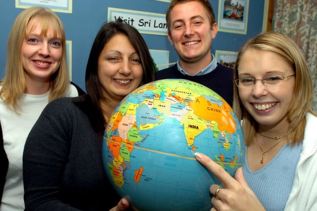 Bawtry Mayflower Primary School teachers,from left, Emma Tulloch, Anna Ruffini, John Bird and Sarah Hoggart are pictured with a globe of the World. Sarah is pointing to the Sri Lanka, where they spent two weeks helping children affected by the Asian Tsunami in 2006