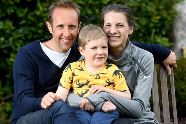 Joshua Collins aged 5 who is diagnosed with Acute Lymphoblastic Leukaemia, pictured with his mum Harriet and dad Ben at their home at Sheffield.