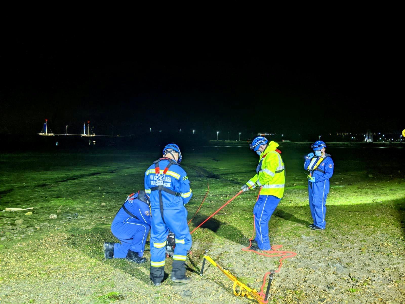 A crew from the Hill Head Coastguard helping to rescue two women stuck in the mud in Hilsea on September 10, 2020.