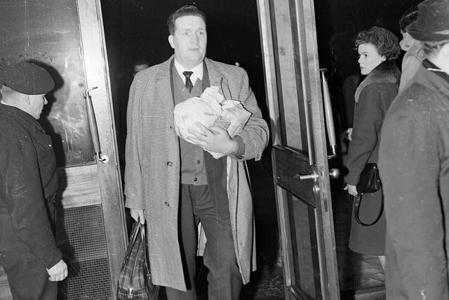Jock Stein arrives at Turnhouse Airport after a trip to Lisbon in 1963.