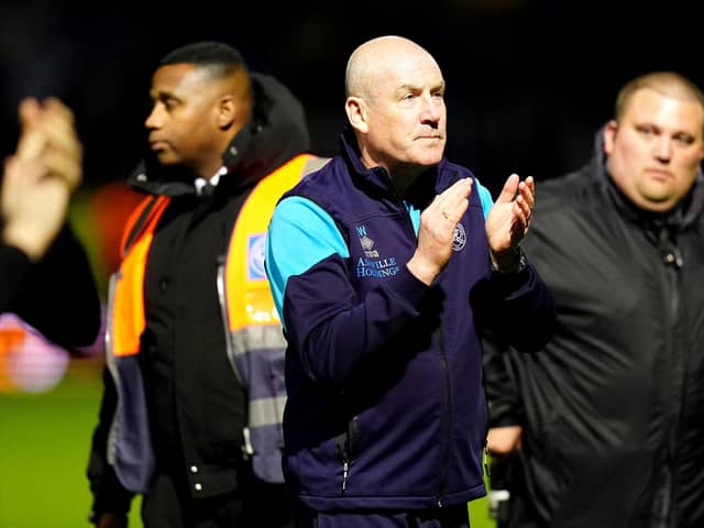 Queens Park Rangers manager Mark Warburton applauds the fans after defeat to Sheffield United: Adam Davy/PA Wire.