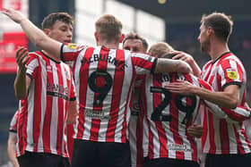 Oliver McBurnie of Sheffield United celebrates with teammates after scoring at West Brom: Andrew Yates / Sportimage