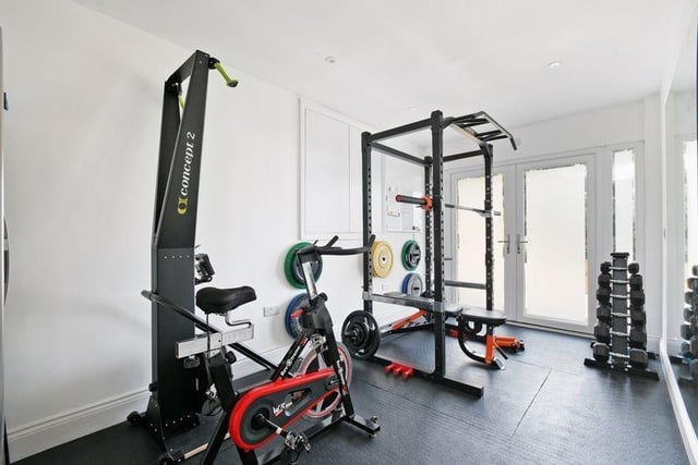 It is a smaller room in this house, but this home gym space has enough room for plenty of workout equipment.