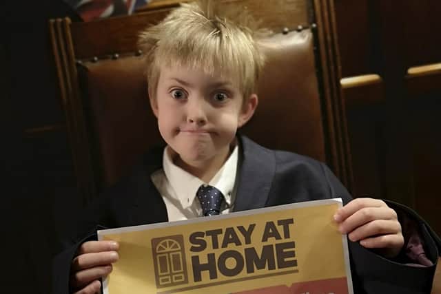 Nine-year-old Bradley James has created a coronavirus-themed rap after his family started teasing him for having hair like Boris Johnson during the lockdown (Pic: Emma Staples/SWNS)