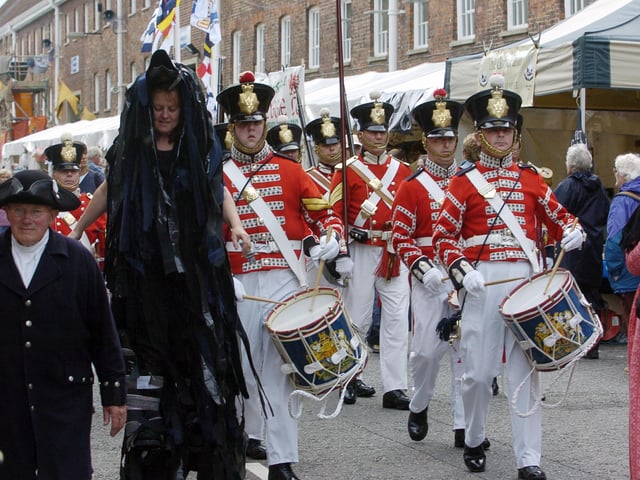 International Festival Of The Sea (IFOS) in the Naval Dockyard , today was the first day of the 4 day festival 28th June 2005
Pictured is a parade in Anchor Lane
Picture Paul Jacobs 053086-1