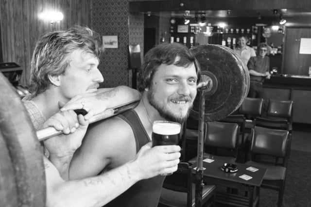 Morris Duke (left) and charity weightlifter "Big Brian" were pictured during practice fora big event at Thorney Close pub. They were raising funds for Anchor Housing Association in 1984.