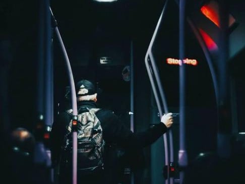 A lone bus rider.