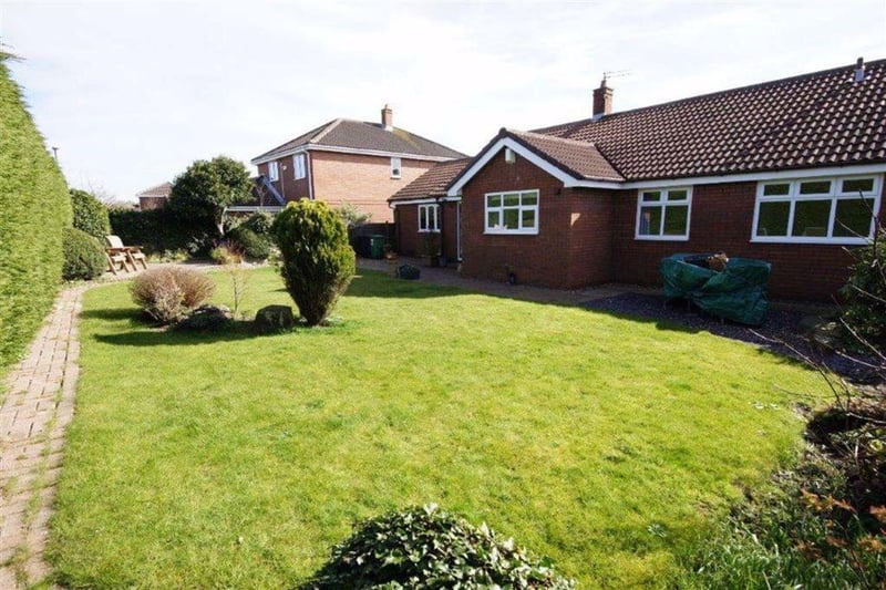 This bungalow is finished off with a spacious garden perfect for the summer.