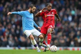 Bernardo Silva of Manchester City is tackled by Terence Kongolo, who boasts Sheffield United among his list of admirers: Alex Livesey/Getty Images