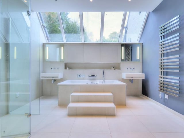 This unbelievable property located in Perthshire has five bedrooms and is on the market for offers over £1,249,999. It is largely open-plan and has two roof terraces and views out to the first hold of the Queens Course.