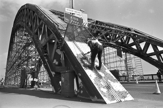 Sunderland's most prominent landmark is getting a lick of paint.  A workman gives Sunderland's Wearmouth Bridge a spruce-up.