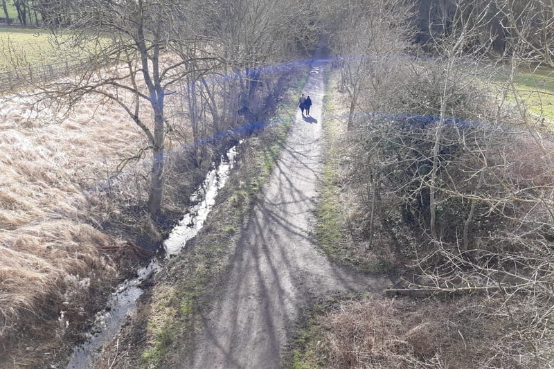 Here you'd see the disused railway line which crosses underneath the road. The line was part of the old Penshaw railway  established in 1852 to carry freight to Hendon. In 1853 it began operating a  passenger service into Sunderland town centre.
