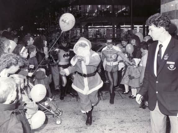 Father Christmas with Batman and Robin at Sunwin House, Sheffield