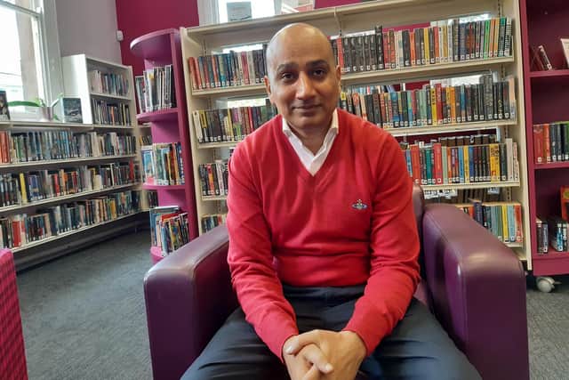 Sheffield councillor Mazher Iqbal in Highfield Library, one of the Welcoming Places set up by the council to help people stay warm this winter, rather than put their heating on during the day