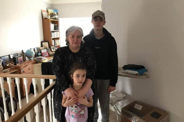 Masha Golovay, who lives in Grenoside, Sheffield, with her niece Agnes, aged seven, and nephew Oleksiy, 17, in Ukraine this week. She hopes to bring them and four other relatives to safety in the UK