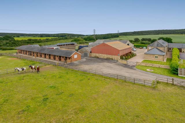 The equestrian centre at Warren Farm Stables in Forest Town, Mansfield, which is on the market for just under £1.5 million. It is approached via a shared private track, and it has its own access to a public bridleway.