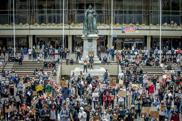 Hundreds of demonstrators gather beneath the Civic Offices and the statue of Queen Victoria.