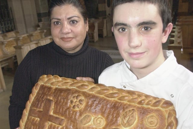 Sheffield College bakery students Hanna Alnoory, 40, and David Fletcher, 16 pictured in Sheffield Cathedral with bread they have baked for Harvest Festival in 2001