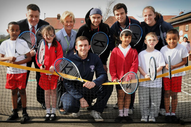 Former Richard Avenue Primary School pupil Jonathan Binding returned to his old school playground to help pass on some tennis-playing skills in 2014.