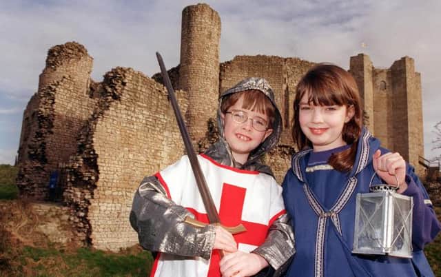 Siblings David and Catherine Bateson visited the castle in 2000 and got dressed up in medieval clothing.