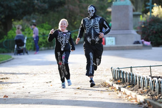 Runners sporting Halloween costumes in this 2019 parkrun.