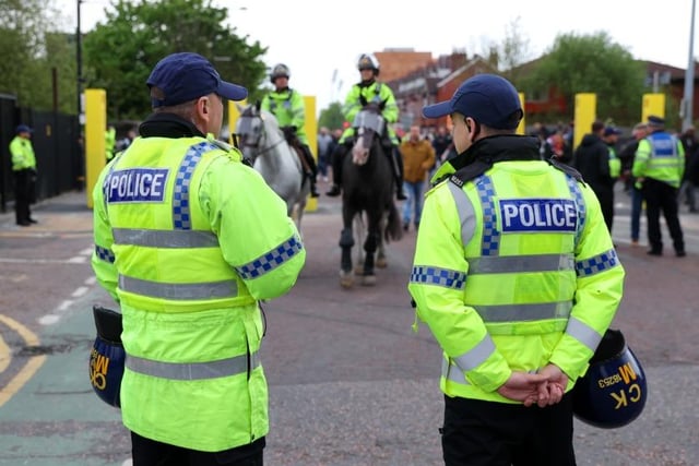 New figures published by the Home Office today reveal that 2,198 arrests were made nationally in the 2021-22 season, 59 per cent higher than in the 2018-19 season.
File picture shows police at a football match. Picture: Getty Images