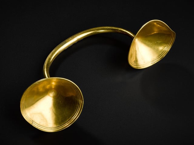 This gold cup-ended ornament may have been used to fasten a dress or cloak.  It was found at Heights of Brae, Easter Ross and dates from between 950BC to 750 BC. PIC: NMS