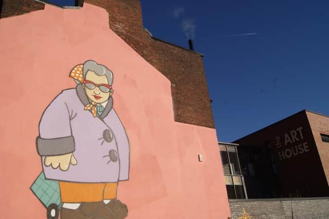 Pete McKee's work Our Muriel features on the back of the building, so you can't bid for this one!